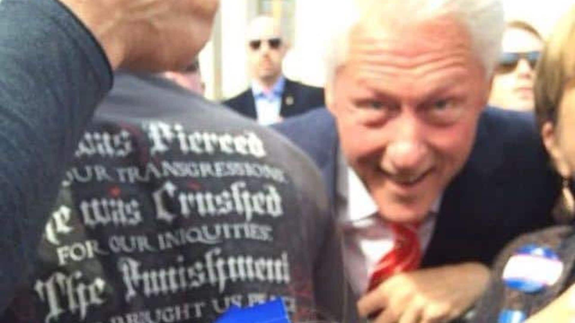 Too cute: Bill Clinton photobombs sad little girl