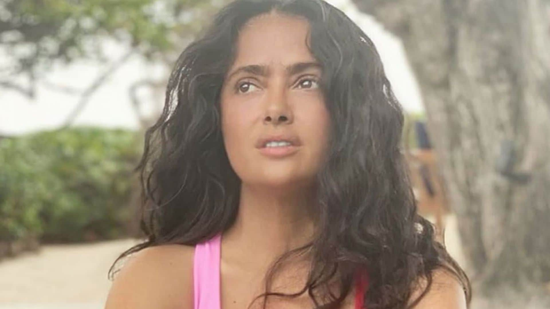 Salma Hayek rocks a bikini for a picture with a wild new friend