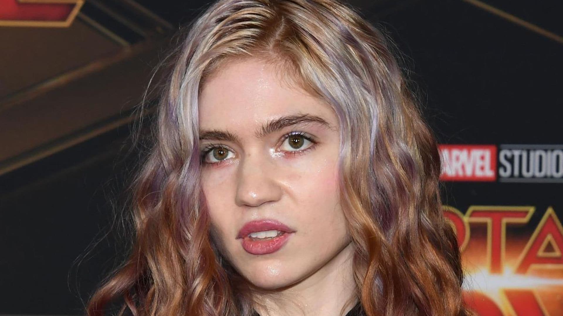 Grimes adds more ‘alien scars’ tattoos to her out-of-this-world collection