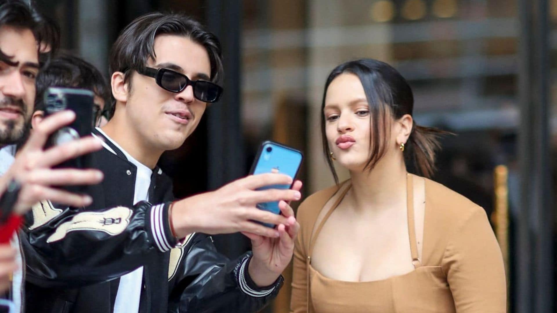 Rosalia greeted fans while leaving her hotel in Paris