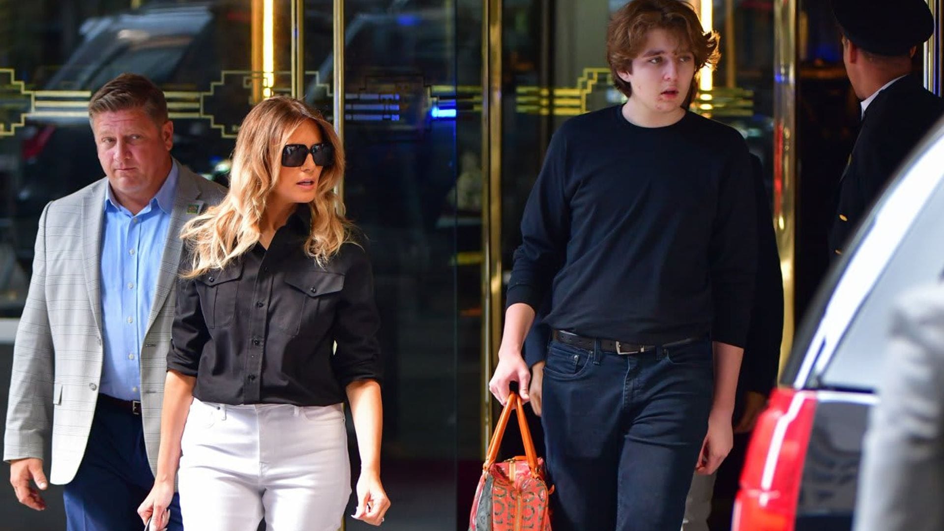 Barron Trump shows off 6-foot-7 stature in NYC walking next to his mom, Melania