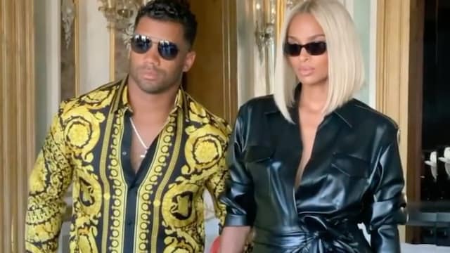 Ciara and Russell Wilson pose for a photoshoot in Italy