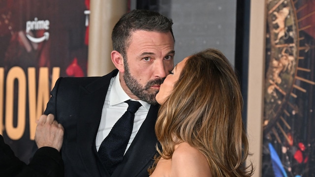 Jennifer Lopez (R) and US actor Ben Affleck kiss as they attend Amazon's "This is Me... Now: A Love Story" premiere at the Dolby Theatre in Hollywood, California, February 13, 2024. (Photo by Robyn BECK / AFP) (Photo by ROBYN BECK/AFP via Getty Images)