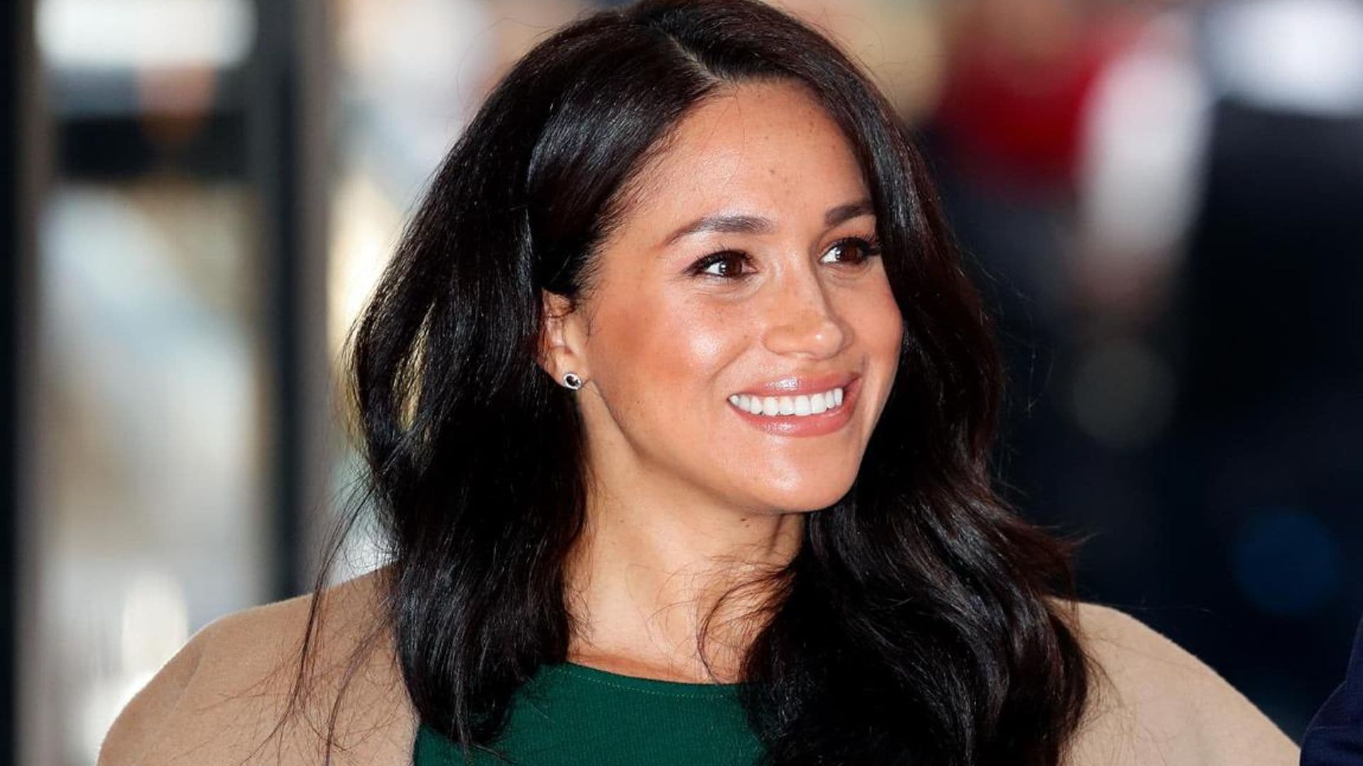 Meghan Markle returns to her favorite color palette wearing a chic $920 dress