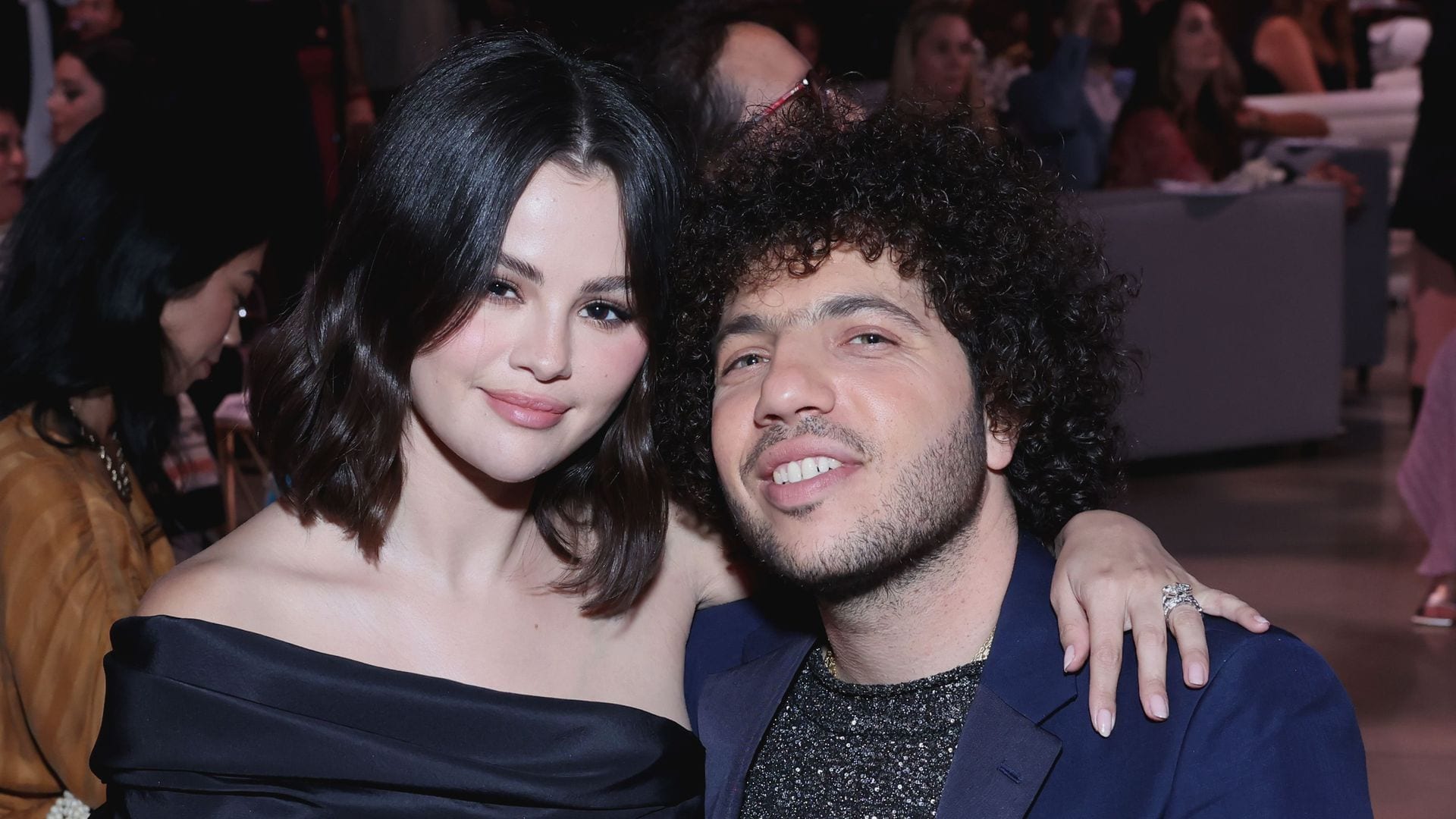 Selena Gomez shows off her engagement ring as she cuddles up to Benny Blanco