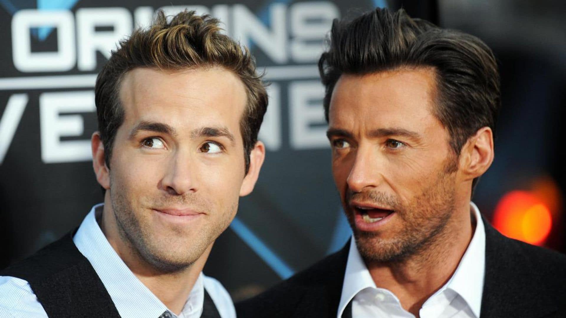 Cast members Ryan Reynolds (R) and Hugh