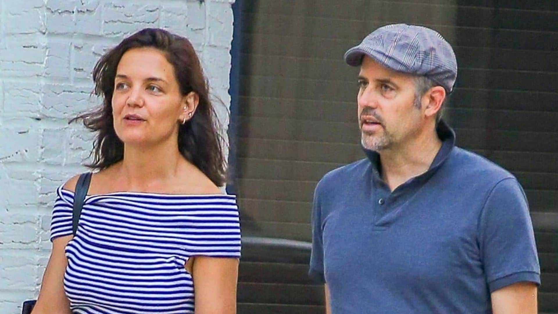 Katie Holmes goes to dinner in a color-coordinated outfit with a mystery man in New York