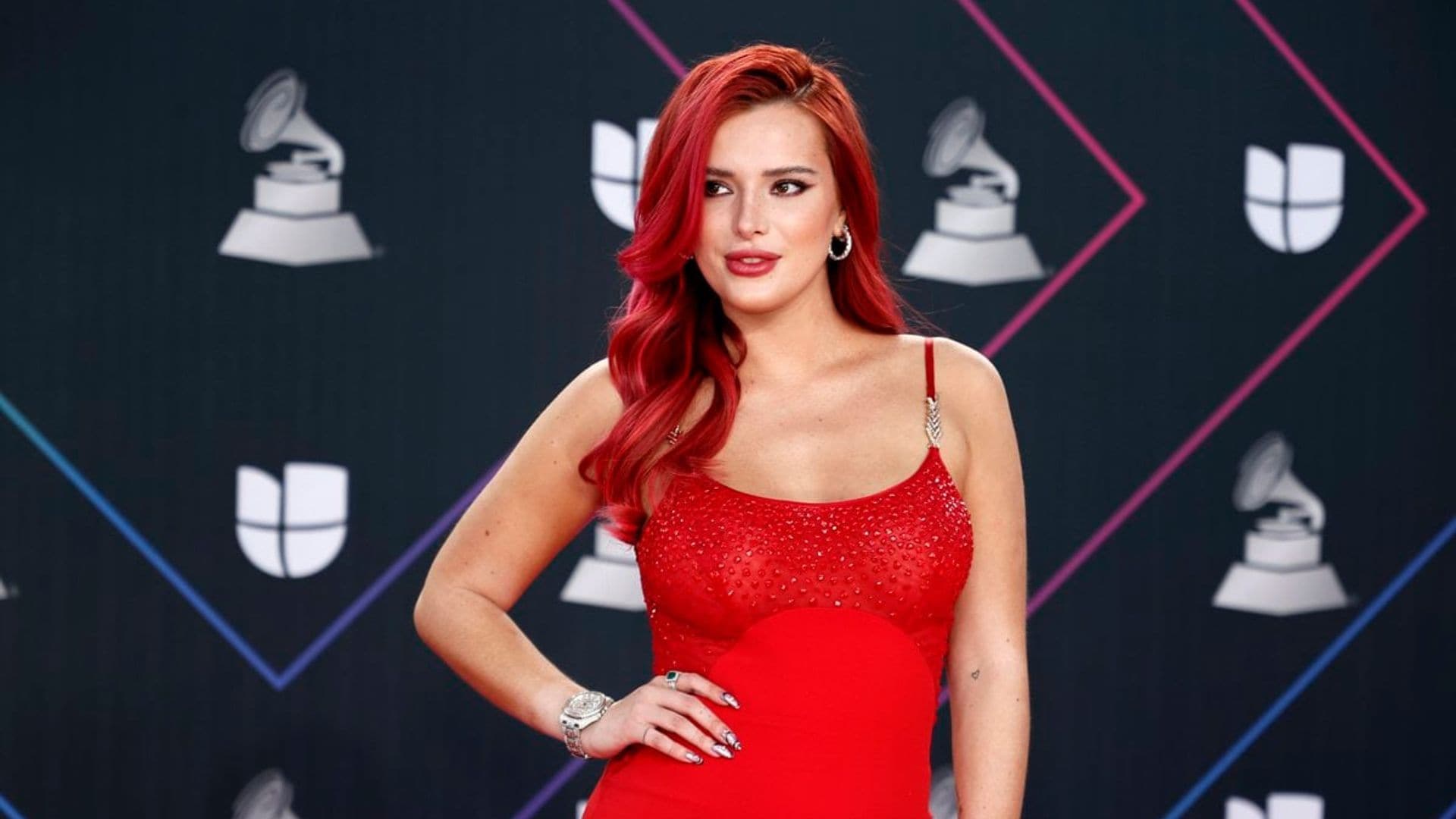 Bella Thorne makes her Latin Grammy Awards debut in a vibran red Versace [PICTURES]