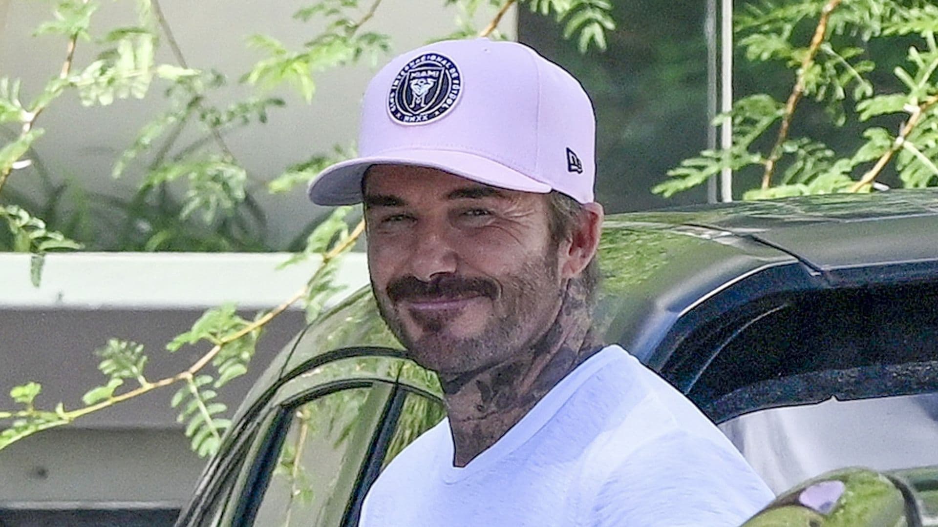 David Beckham smiles as he visits his new $77 million mansion in Miami