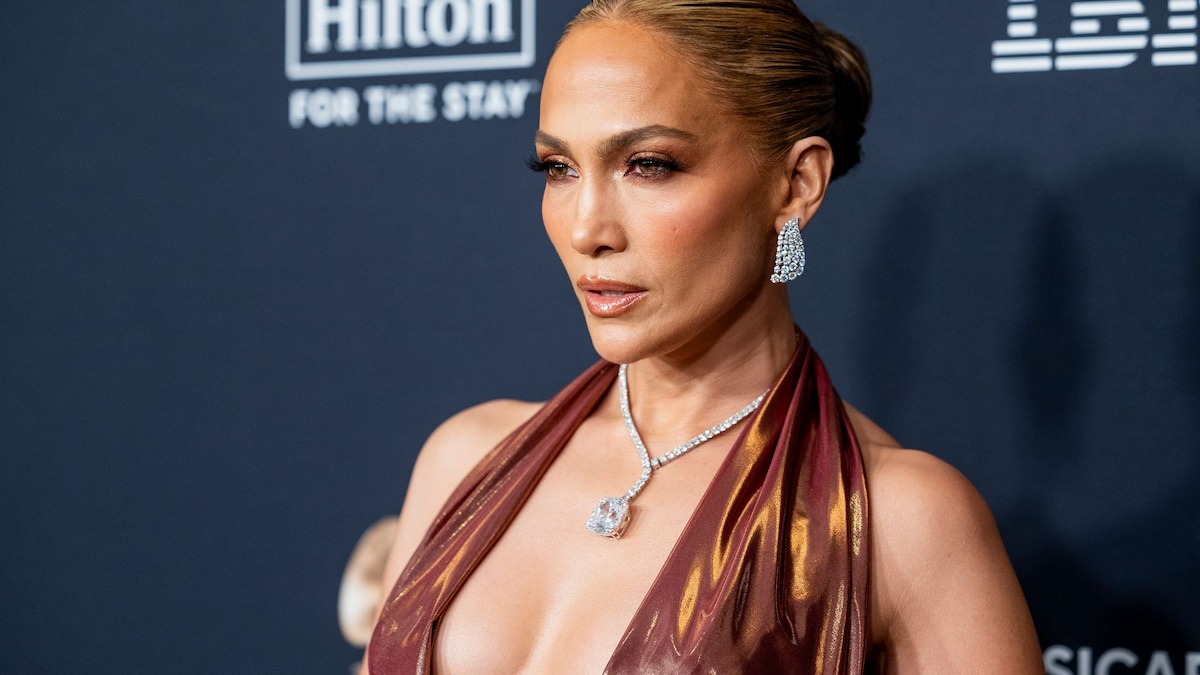 Jennifer Lopez stuns in plunging gown during pre-Grammys party appearance