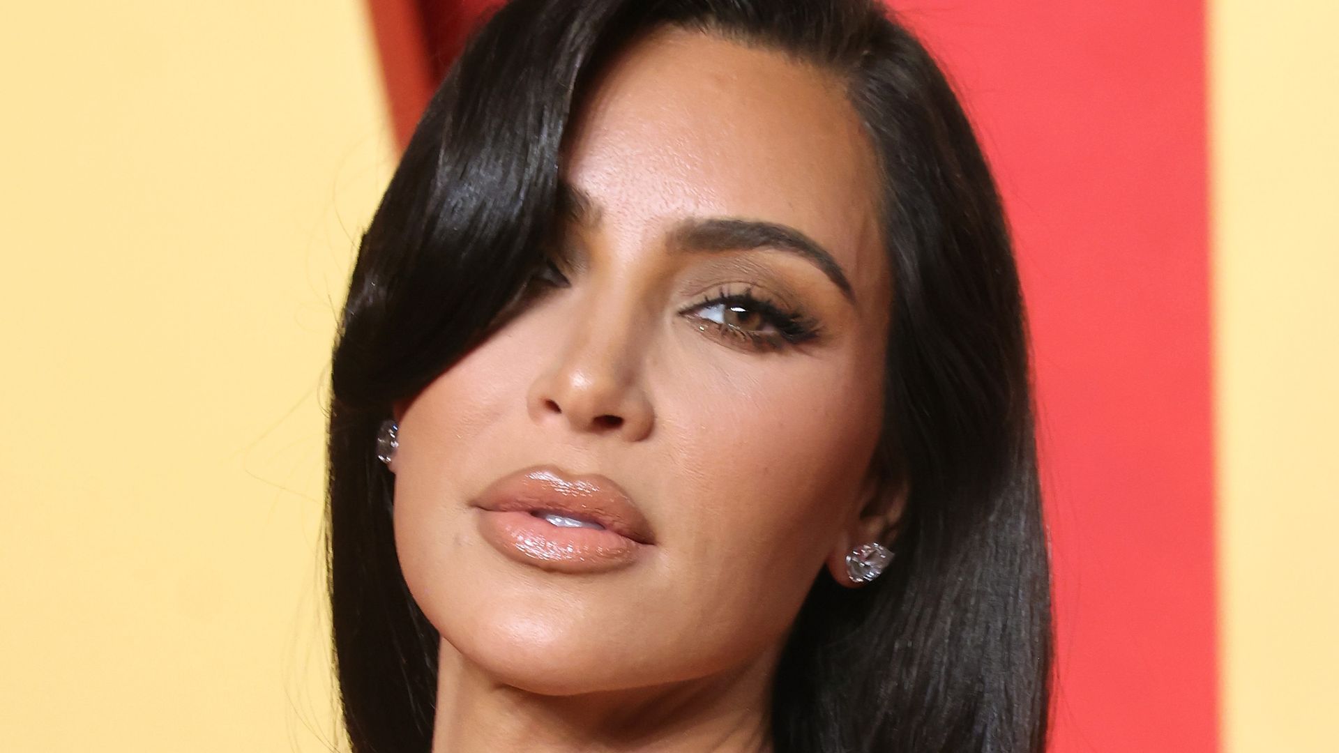 Kim Kardashian's extra-long bangs are the holiday hair trend you need to try