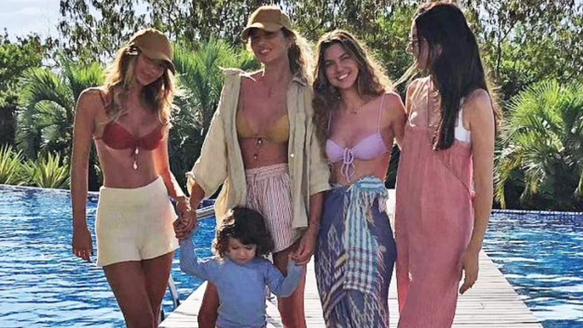 Gisele Bündchen shares a stunning swimsuit snap with her sisters