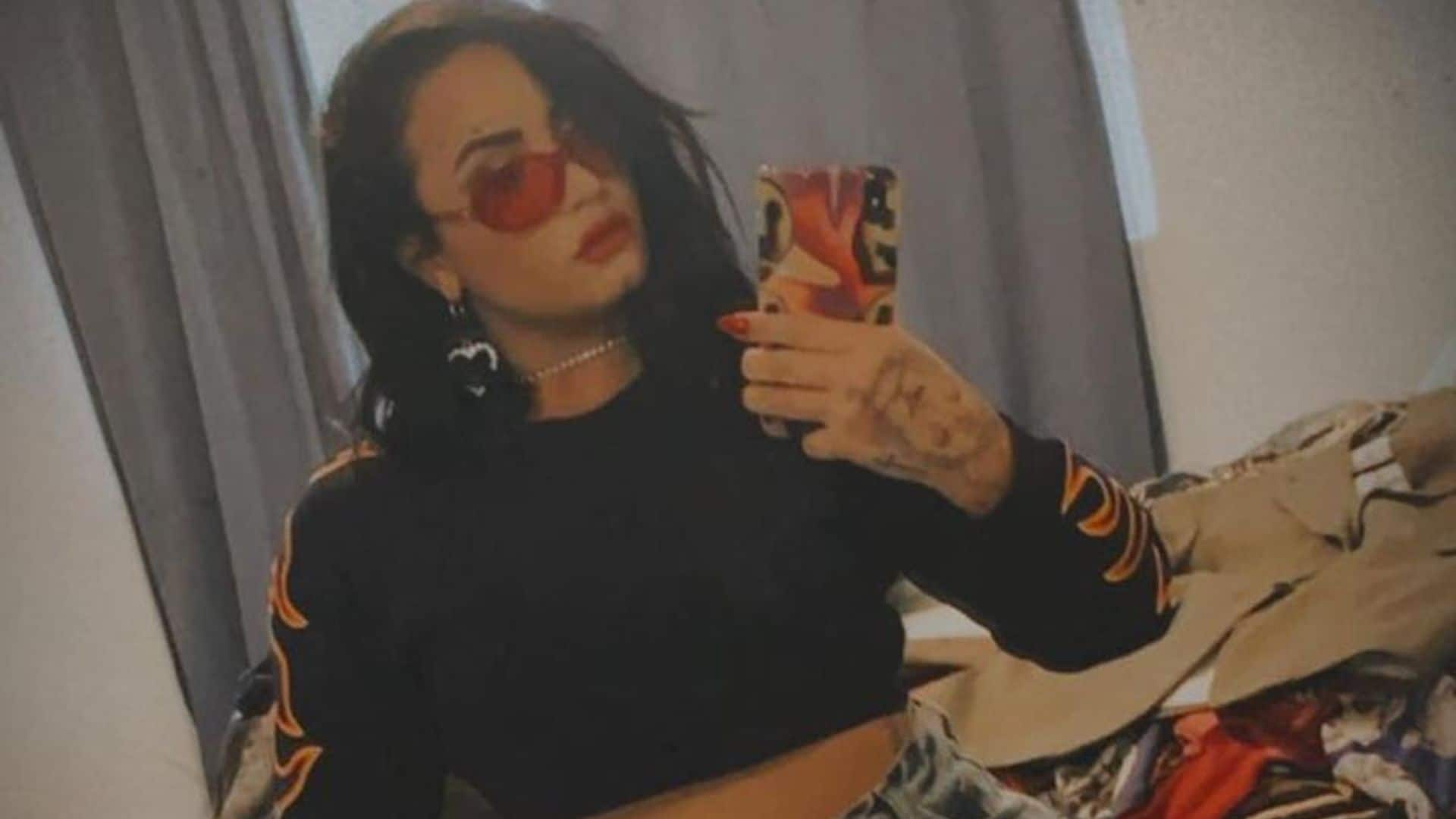 Demi Lovato shares a glimpse inside her bedroom and a relatable moment after getting dressed