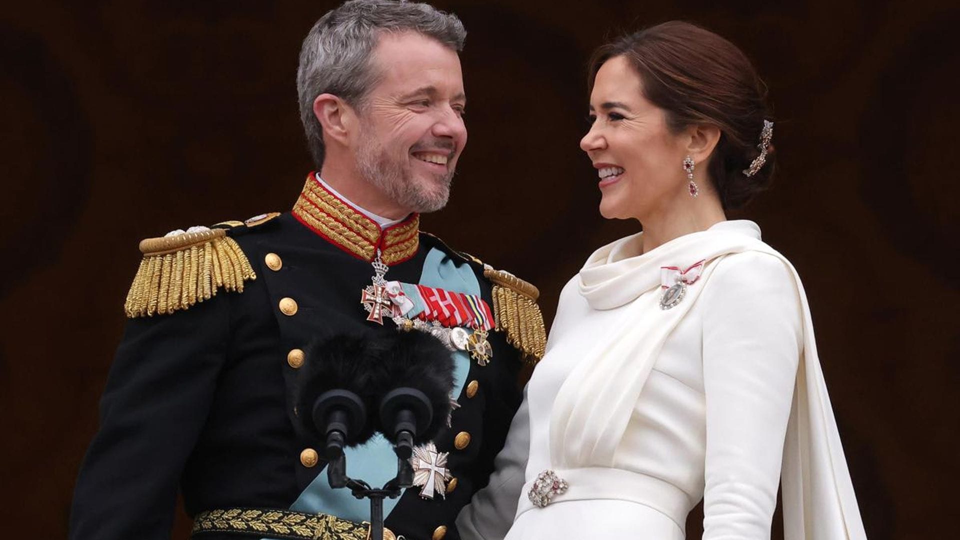 Frederik and Mary share a sweet kiss after becoming King and Queen