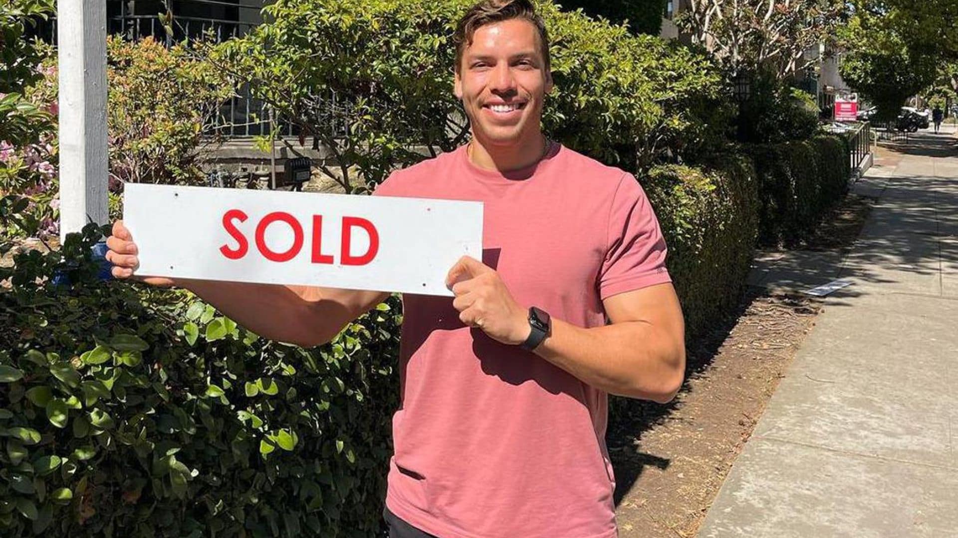 Joseph Baena celebrates his real estate success after selling a home