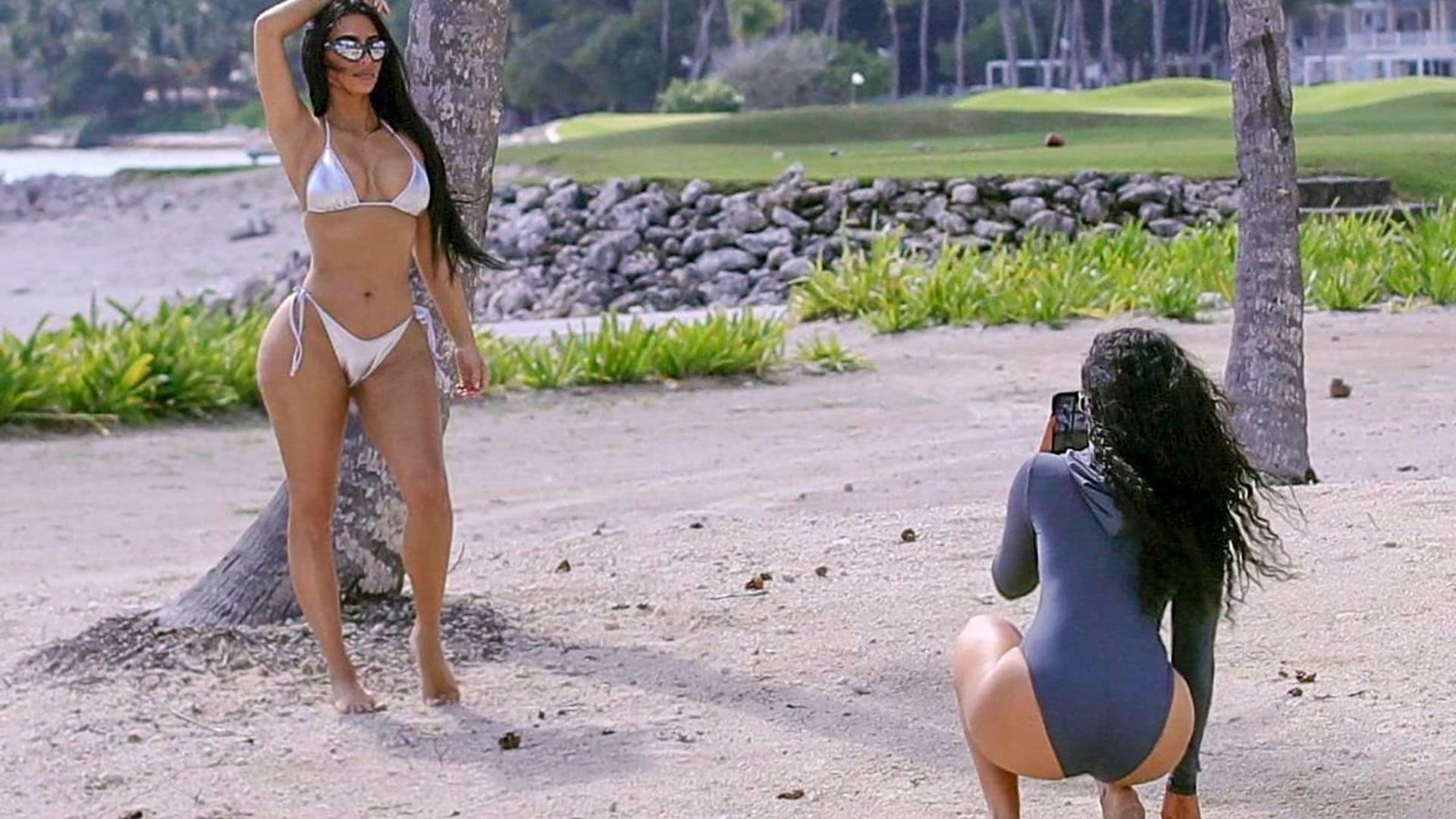 Kim Kardashian Poses in a Silver Bikini to Promote her New SKIMS swimsuit line