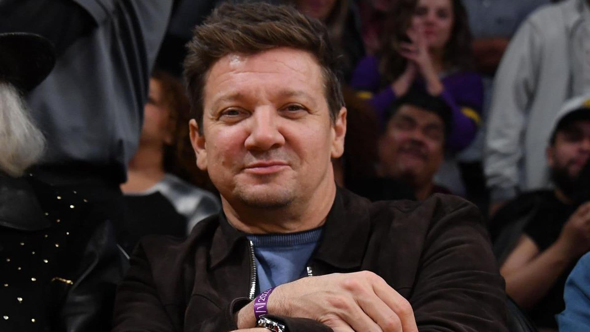 Jeremy Renner is all smiles at the Lakers game after near-fatal accident