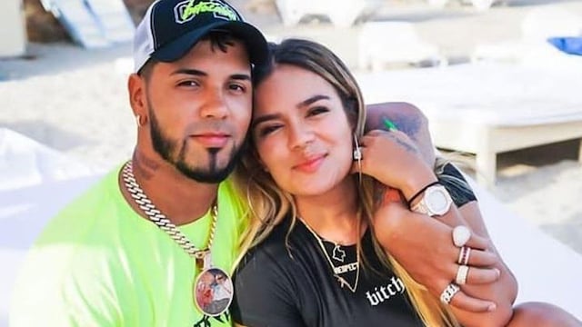 Karol G and Anuel AA posing together