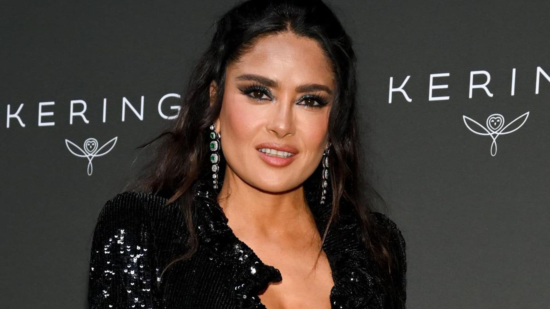 Salma Hayek poses in side-tie bikini during yacht outing