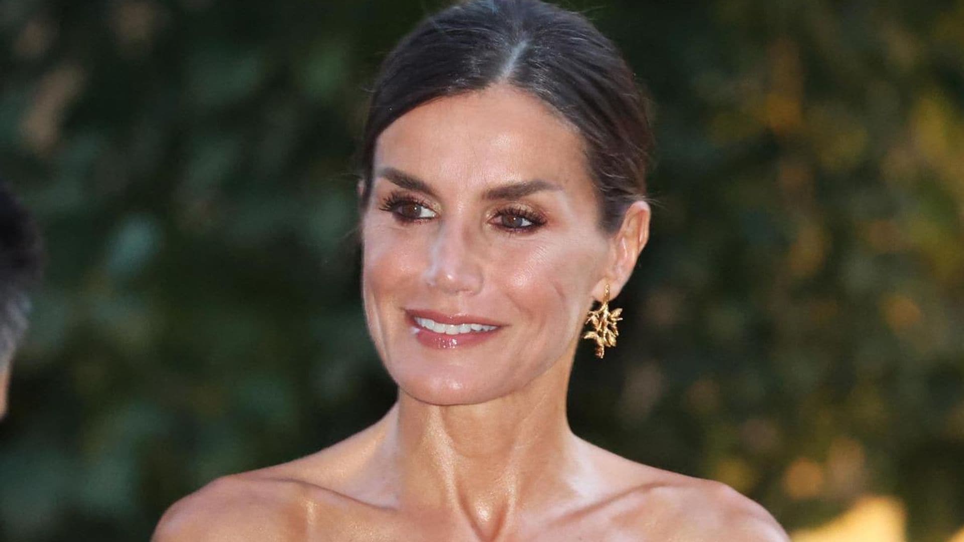 Queen Letizia bares her shoulders in summer maxi dress