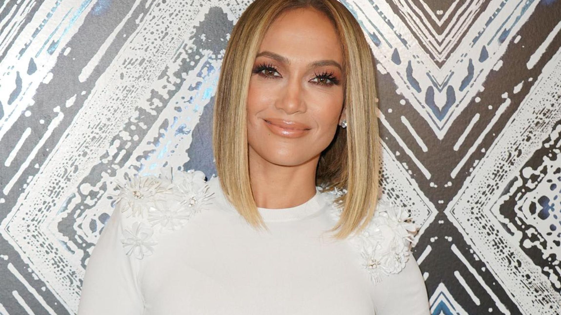 Jennifer Lopez returns to work, teases ‘something muy caliente’