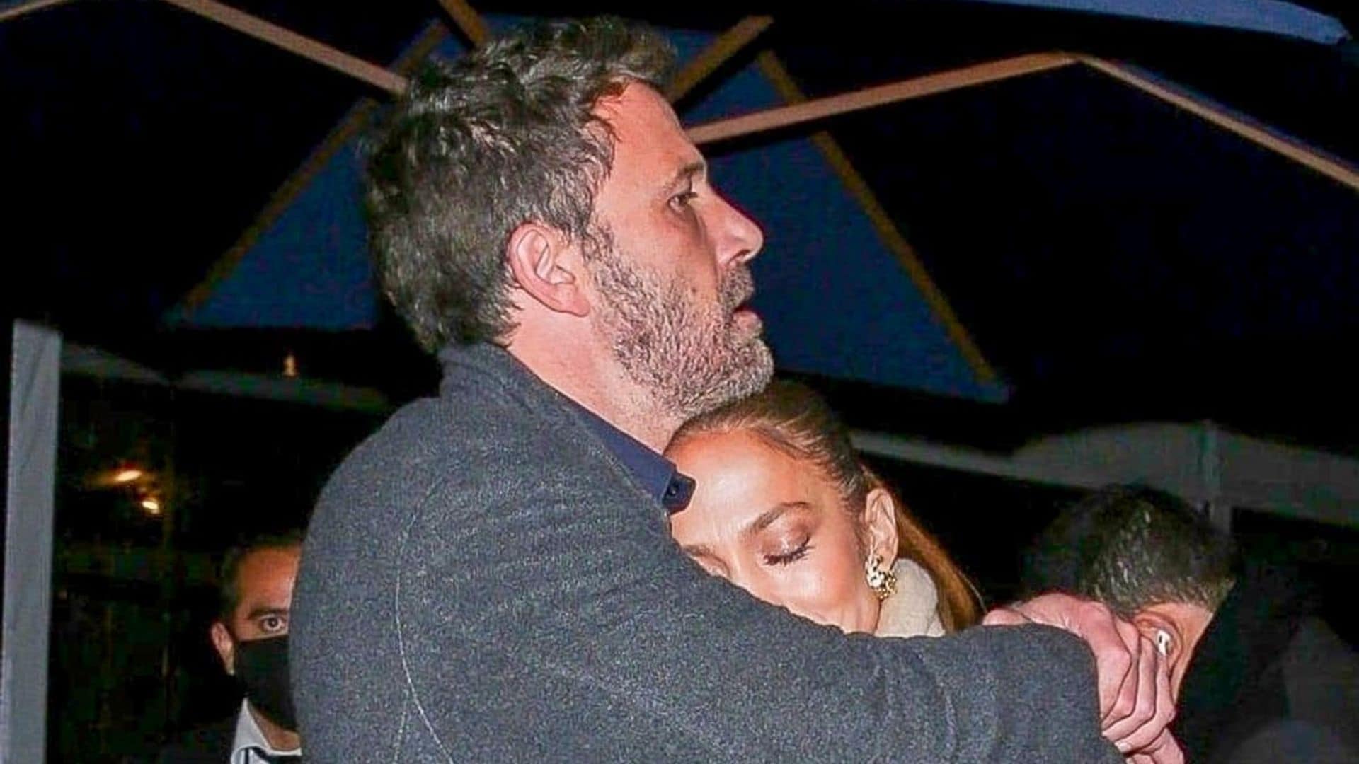 Jennifer Lopez and Ben Affleck flaunt their love while waiting outside a restaurant in Beverly Hills