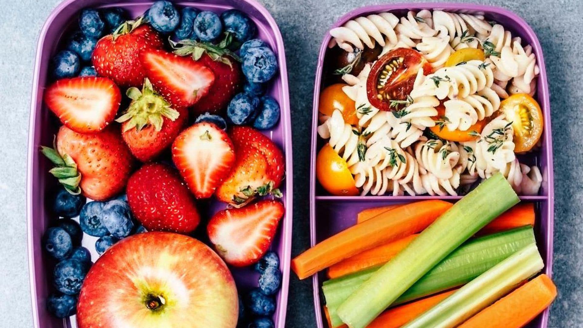 Kids holding bento box