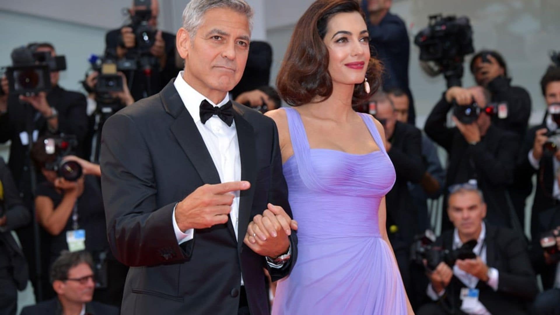 George and Amal Clooney step out for first red carpet since welcoming twins in Venice