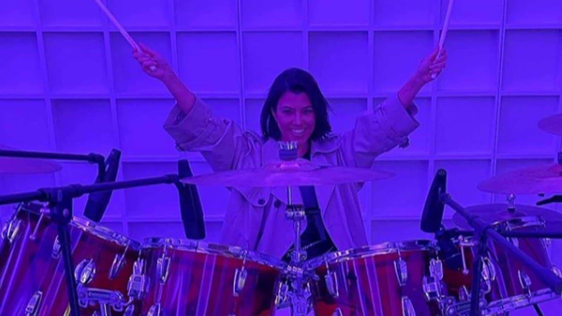 Kourtney Kardashian looks great playing the drums