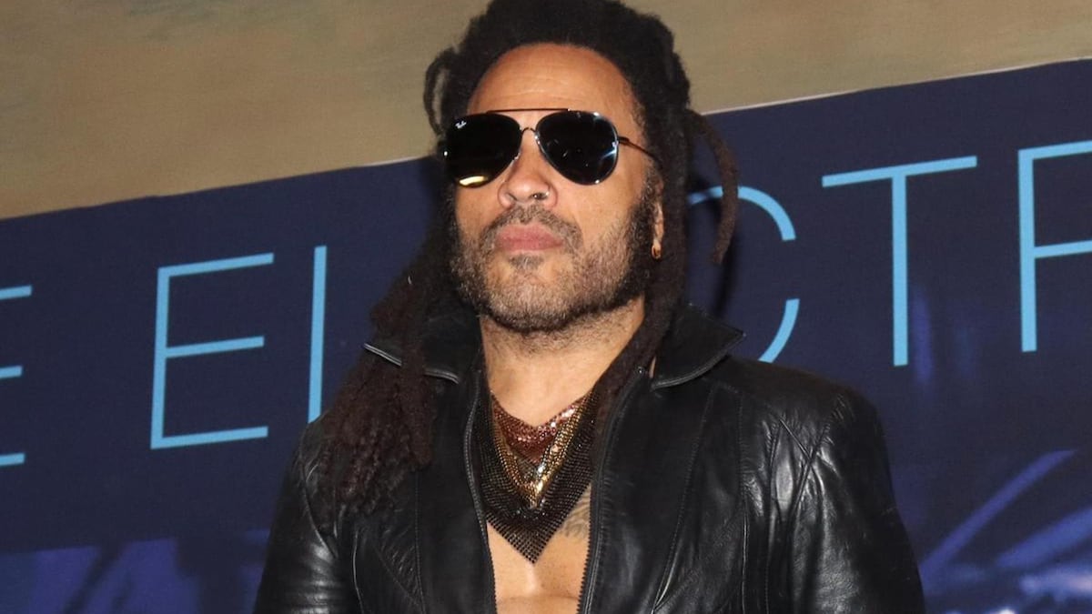 Lenny Kravitz works out in leather pants and boots