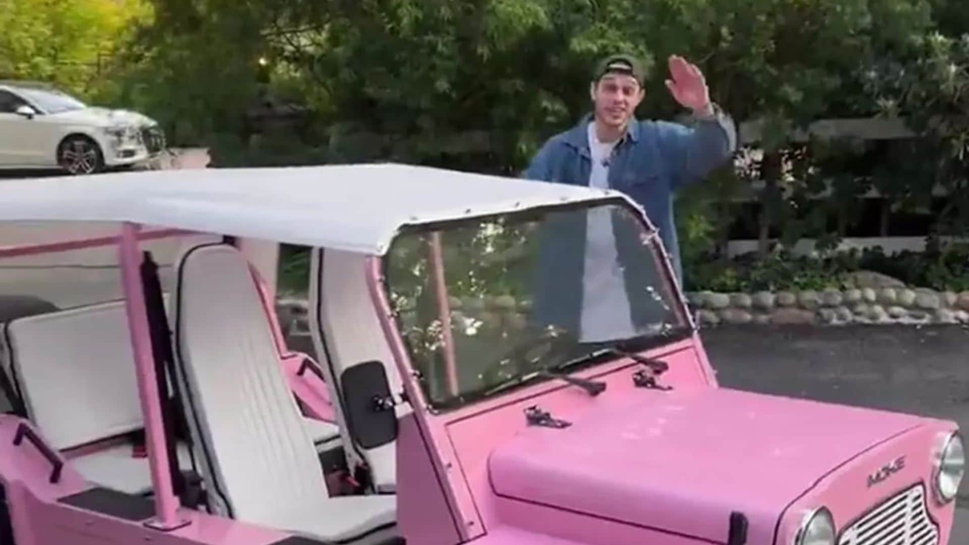 Pete in pink! Kim Kardashian’s boyfriend drives her custom Moke electric car