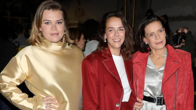 Princess Stephanie of Monaco posing with daughter Pauline and Camile at Paris Fashion Week