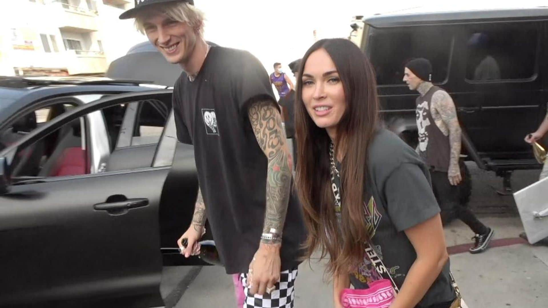 Megan Fox celebrates with Machine Gun Kelly after his album makes Number one