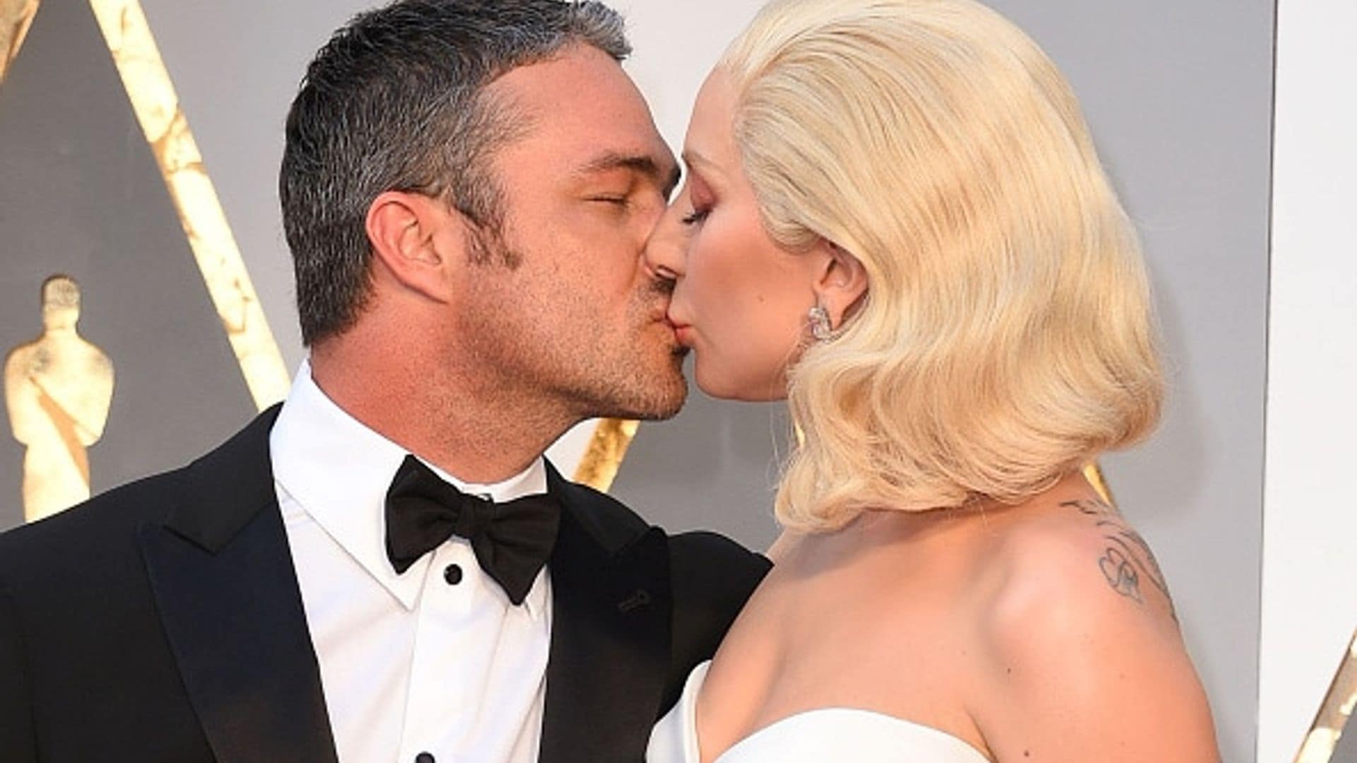 February 2016: Gaga planted a kiss on her leading man during the 88th Annual Academy Awards.
<br>
Photo: Getty Images