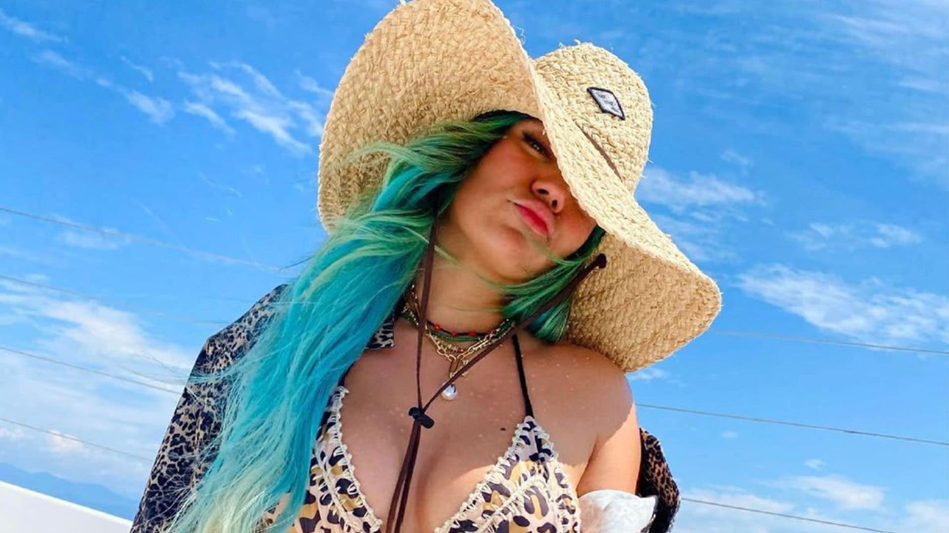 Karol G parties on a yacht in Colombia and Anuel AA posts cryptic message