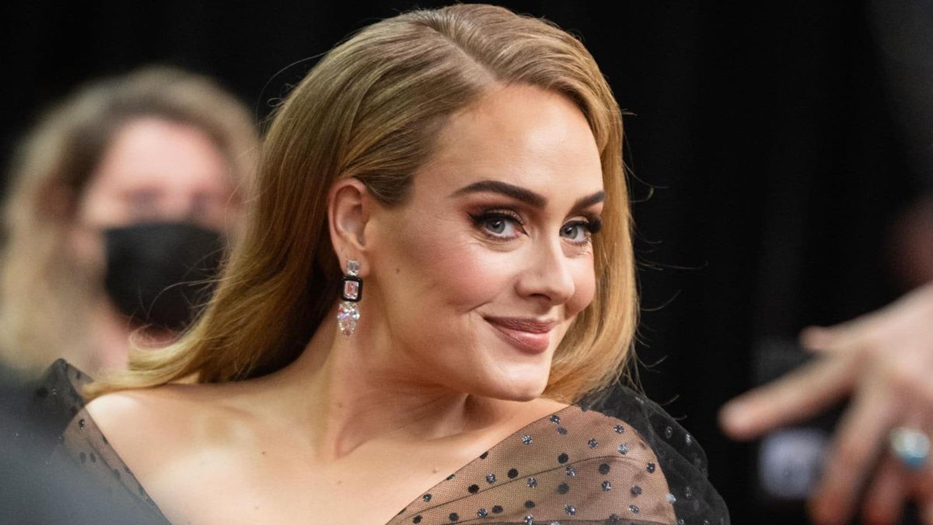Adele celebrates her 34th birthday in custom Carolina Herrera mini-dress