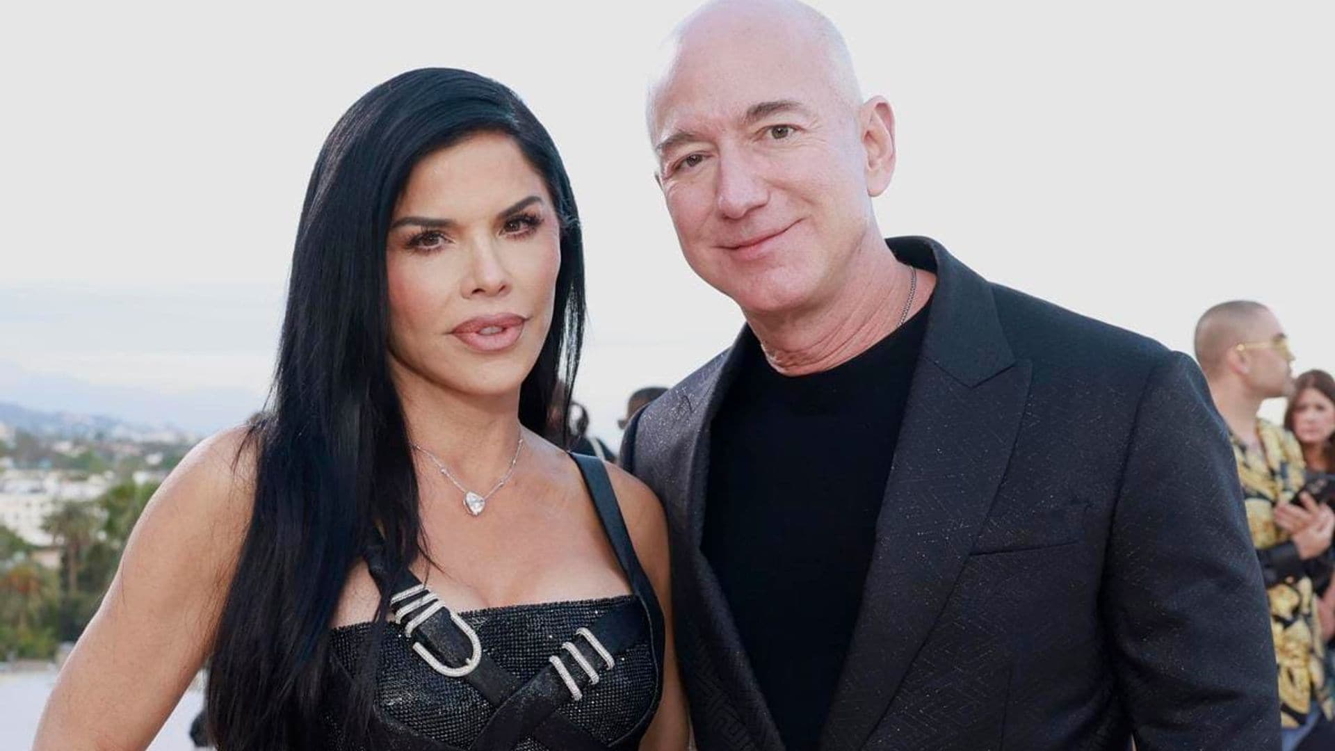 Lauren Sanchez and Jeff Bezos sit front row at the Versace show