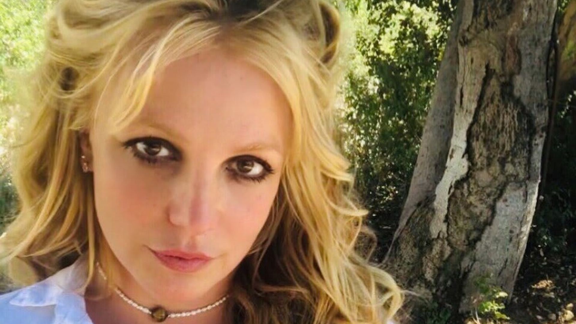 Britney Spears challenges fans to find her in ‘freaking cool’ waterfall photo