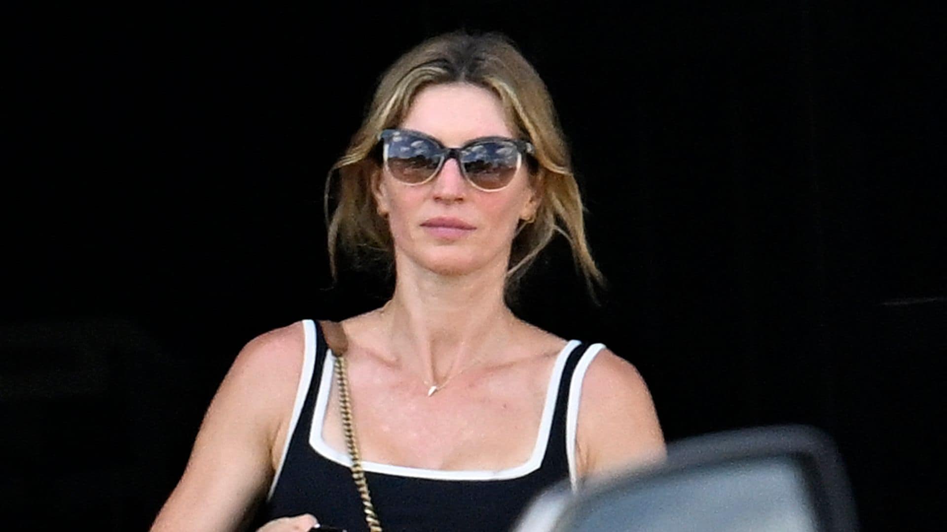 Gisele Bündchen showcases her postpartum figure in a cheetah print swimsuit