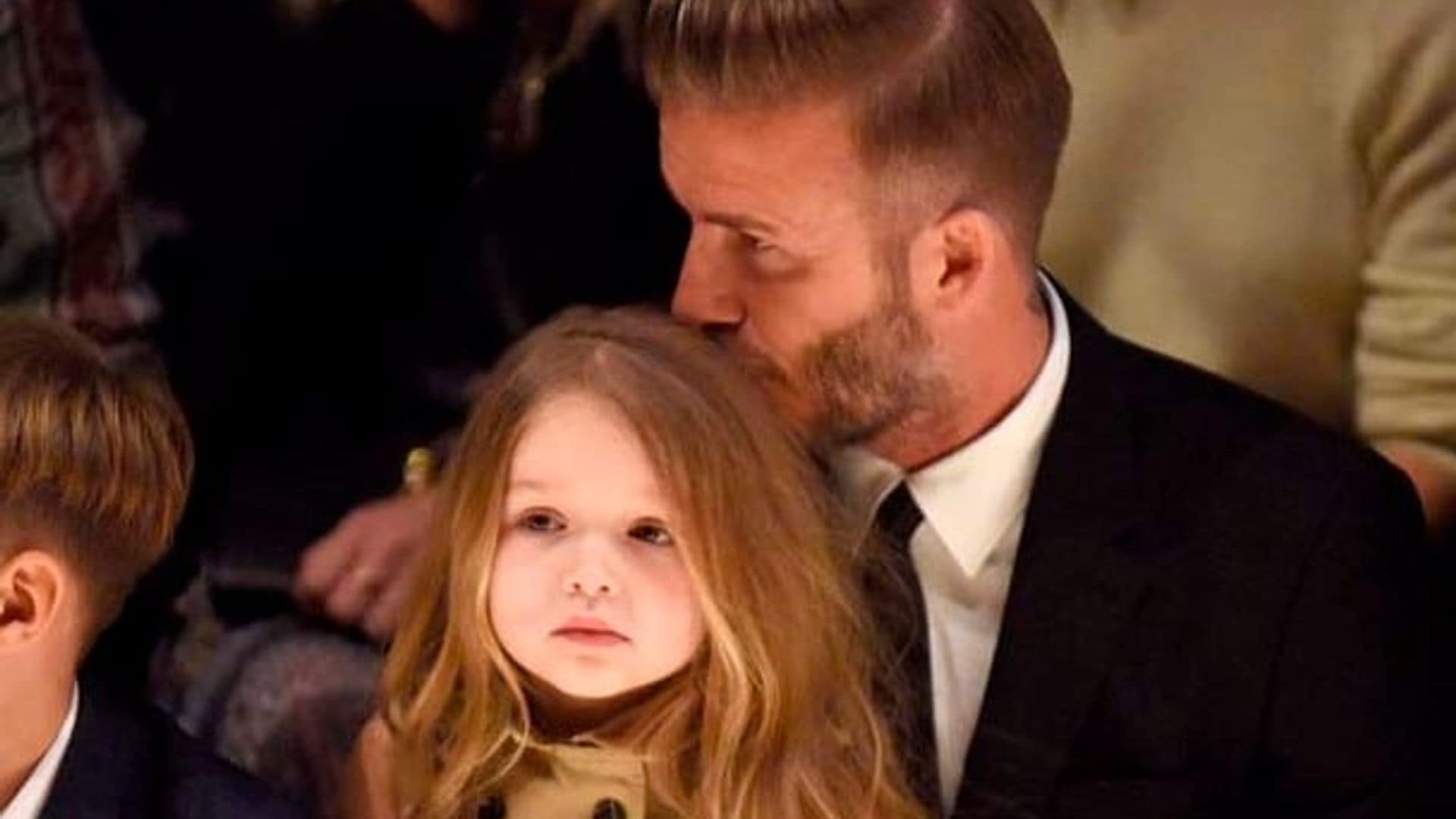 David sweetly kissed his 3-year-old daughter on the head at Burberry's 'London in Los Angeles' show in April 2015. Harper, whose light-brown locks matched her Burberry dress, attended the show with her whole family, but stayed close to daddy.
Photo: Getty Images