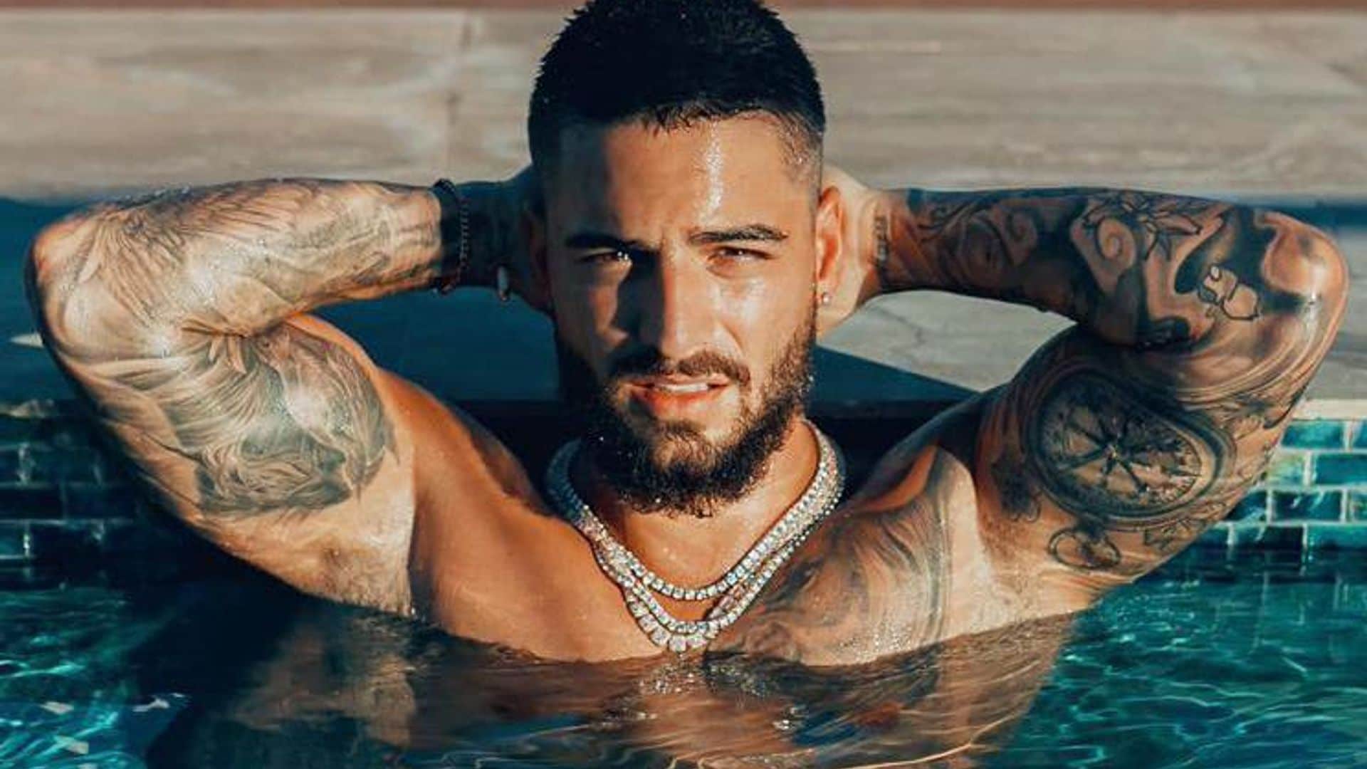 Maluma shows off body (and tattoos) while vacationing with girlfriend