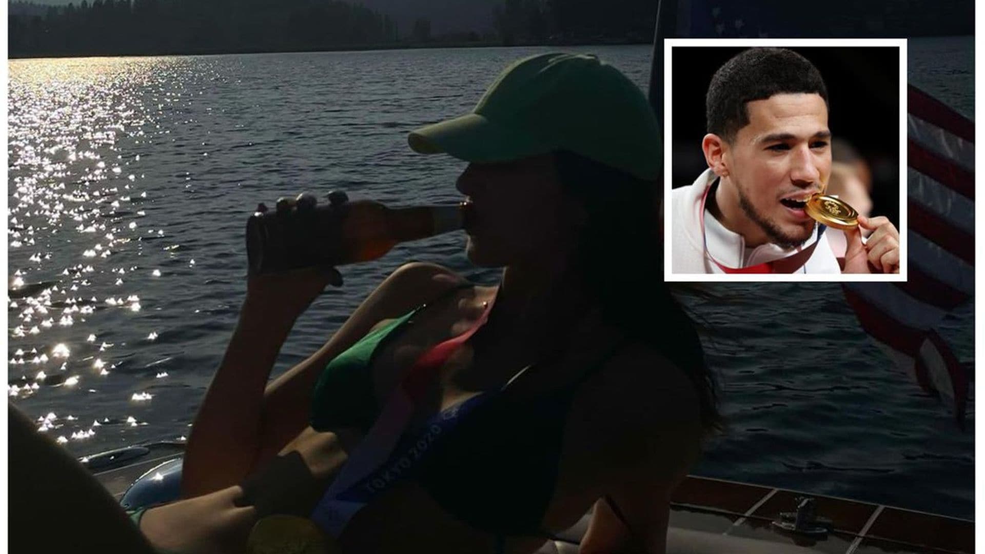 Kendall Jenner poses with Devin Booker’s Olympic gold medal and a bottle of beer while on a lake date