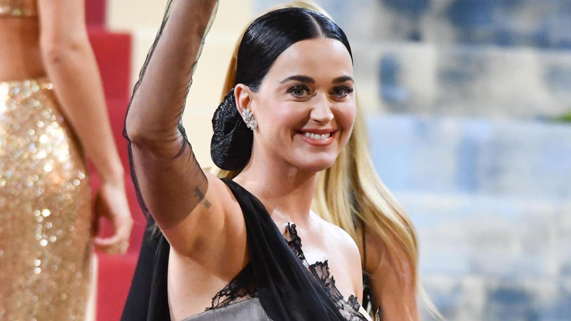 Katy Perry hilariously reacts to viral video of her throwing pizza slices to fans at a nightclub