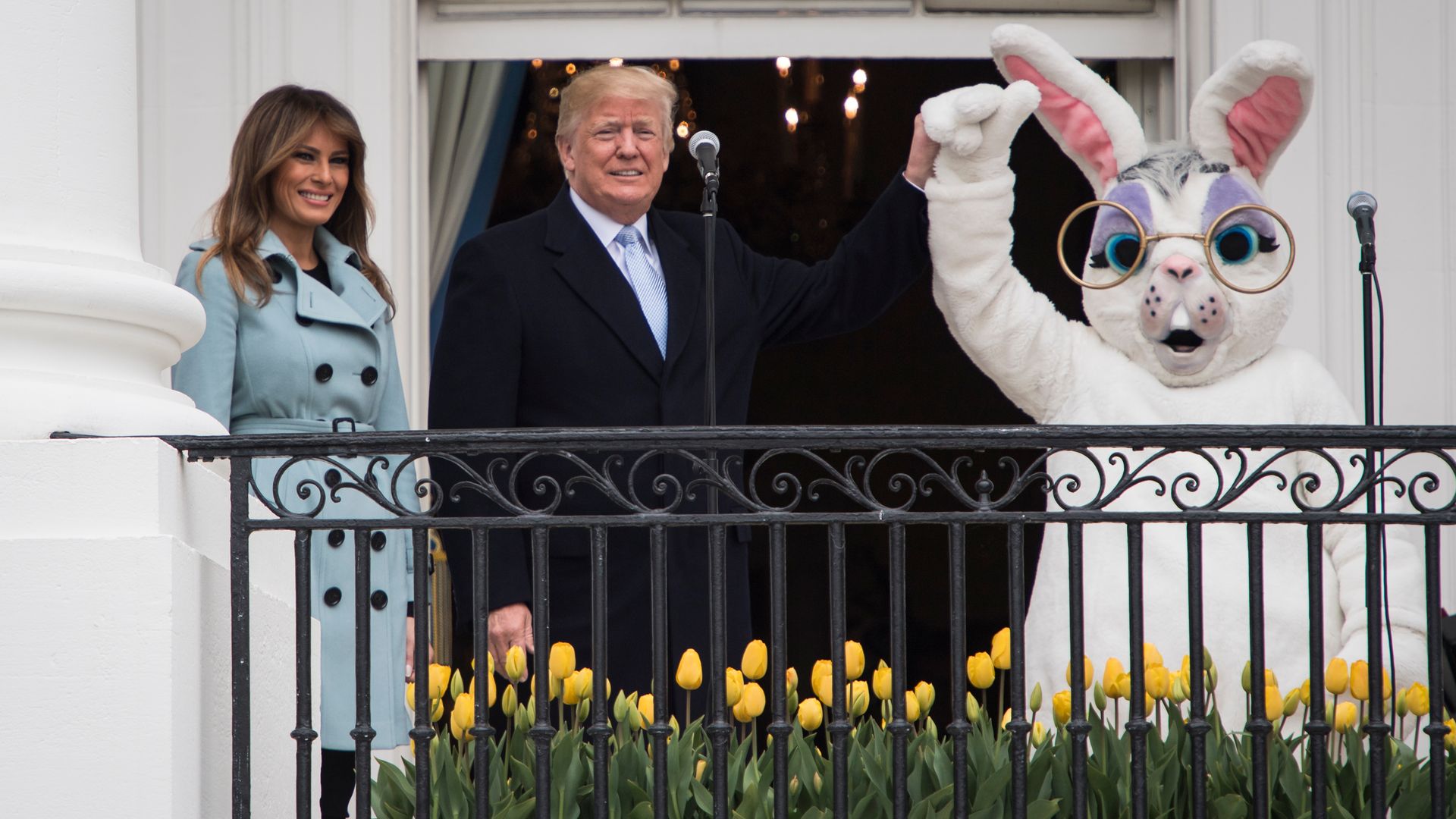 WASHINGTON, DC - APRIL 2: President Donald J. Trump, with first lady Melania Trump and the Easter Bunny by his side, speaks during the 2018 White House Easter Egg Roll held on the South Lawn of the White House on Monday, April 02, 2018 in Washington, DC. (Photo by Jabin Botsford/The Washington Post via Getty Images)