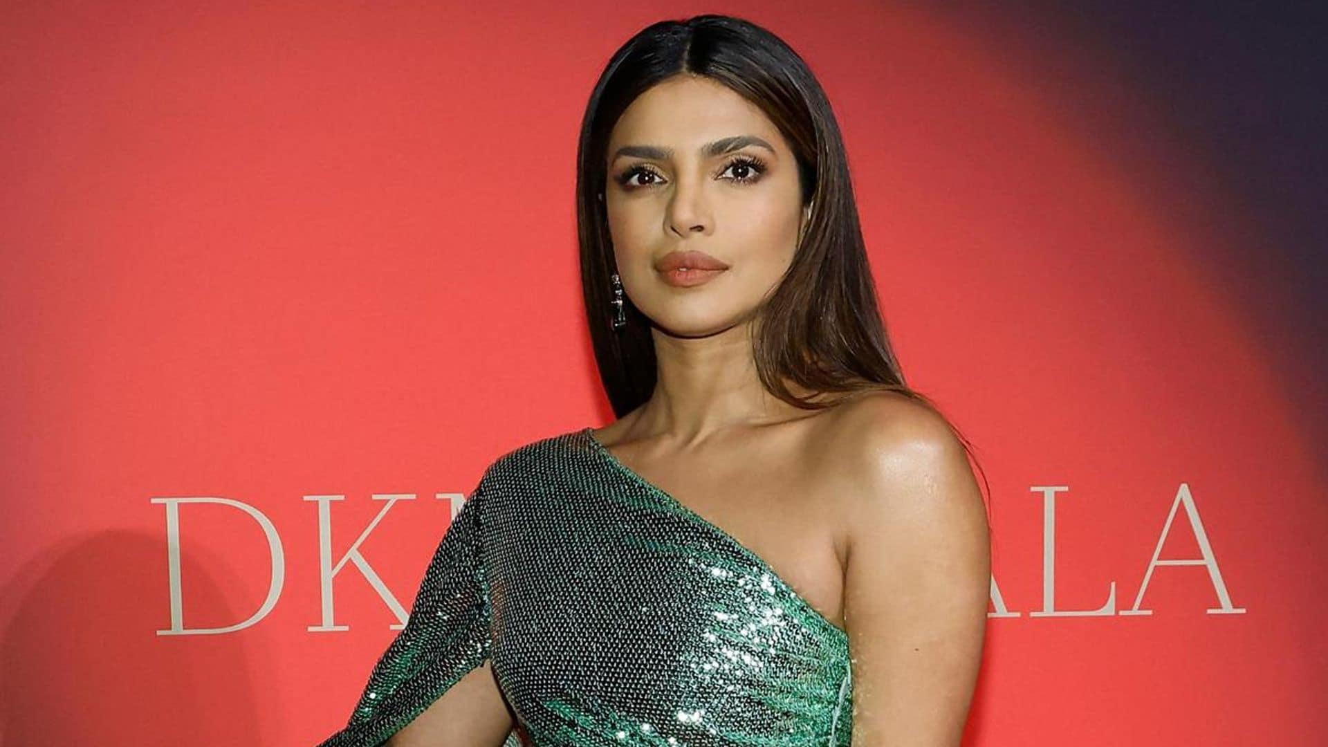 Priyanka Chopra exudes timeless elegance in a metallic emerald gown at the DKMS Gala