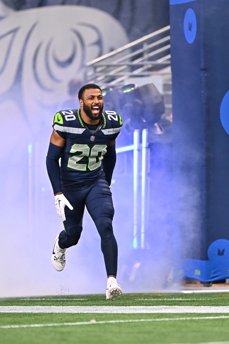 Julian Love, #20 of the Seattle Seahawks, runs out of the tunnel prior to an NFL preseason football game against the Cleveland Browns at Lumen Field on August 24, 2024, in Seattle, Washington. The Seahawks defeated the Browns 37-33. (Photo by Alika Jenner/Getty Images)