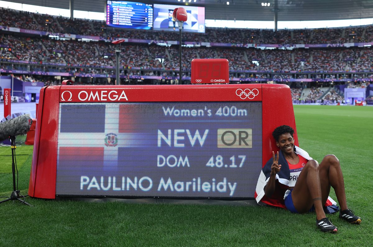 Marileidy Paulino of Team Dominican Republic celebrates winning gold and breaking the Olympic Record in the Women's 400m Final on day fourteen of the Olympic Games Paris 2024 at Stade de France on August 09, 2024 in Paris, France. (Photo by Michael Steele/Getty Images)