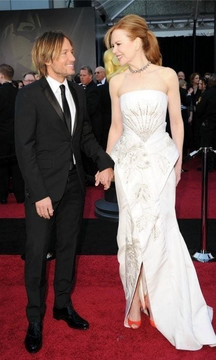 Such a gentleman! The country singer escorted his wife on the red carpet at the 2011 Academy Awards.
<br>
Photo: Jason Merritt/Getty Images