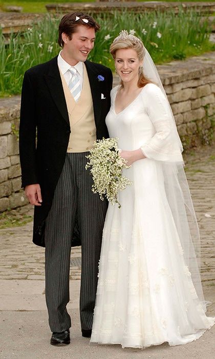 The bride, clutching her sweet bouquet of lily-of-the-valley, joined her new husband still with the congratulatory petals in his hair outside the church.
Photo: Getty Images