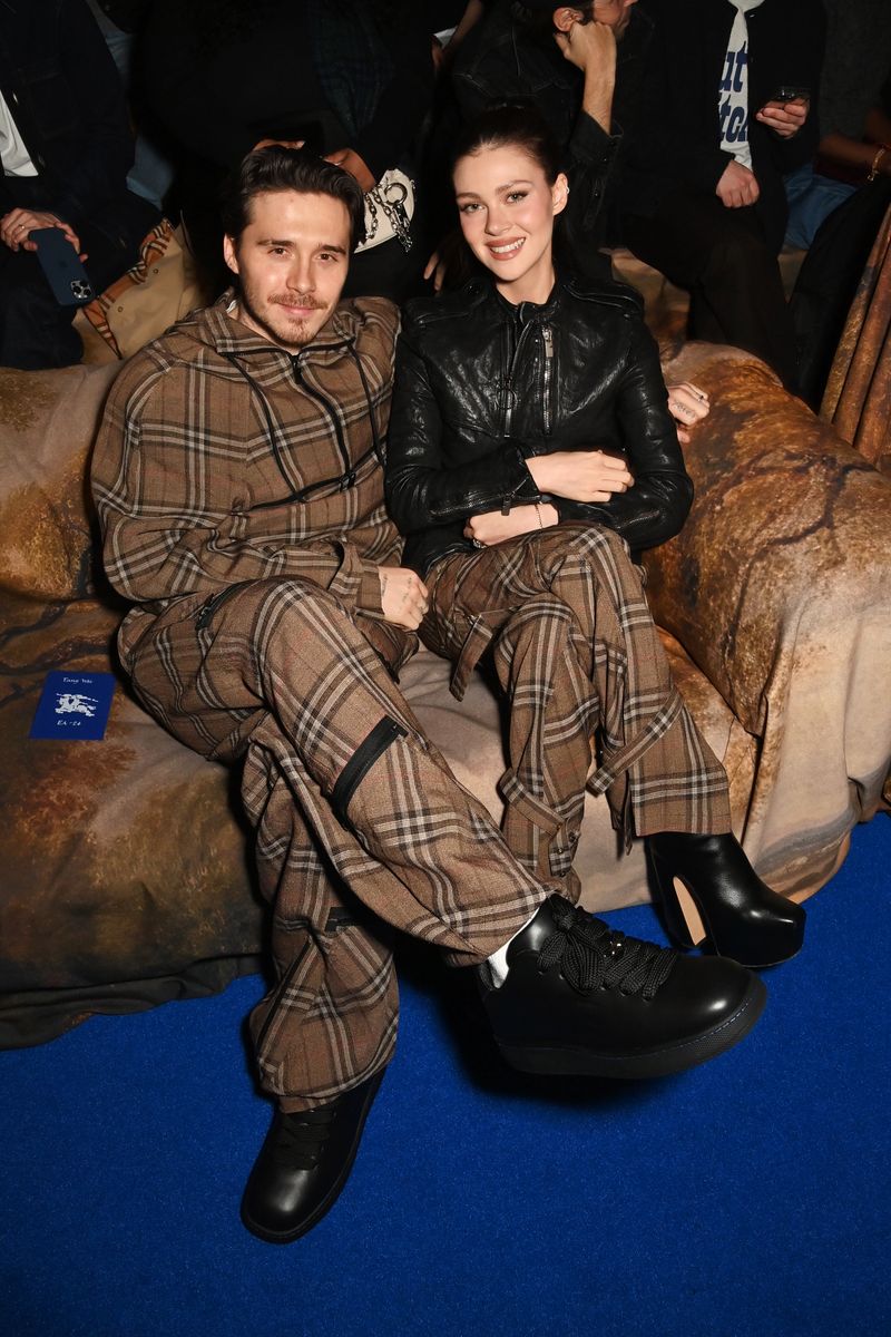 Brooklyn Beckham and Nicola Peltz attend the Burberry Winter 2025 show during London Fashion Week on February 24, 2025 in London